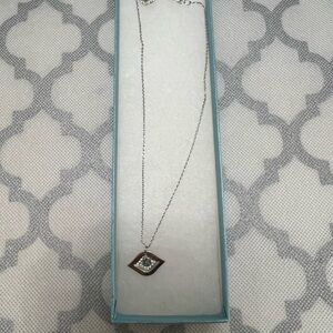 Touchstone Crystal Silver Geometric Pendant Necklace
